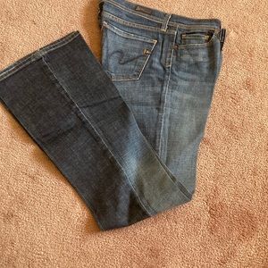 Low waist flares. Size: 29 FIT TIGHT.  Inseam: 33 in.